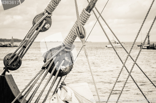 Image of Blocks and rigging of an old sailboat, close-up  