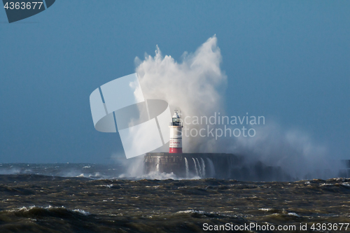 Image of Waves over Lighthouse