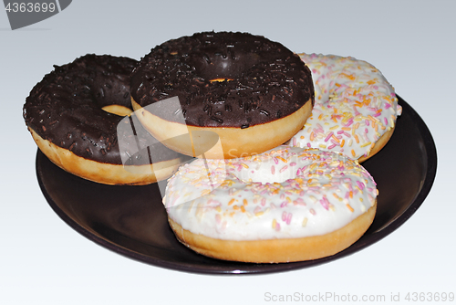 Image of Donuts on a plate.