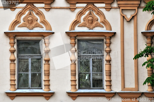 Image of Two Windows with moldings.