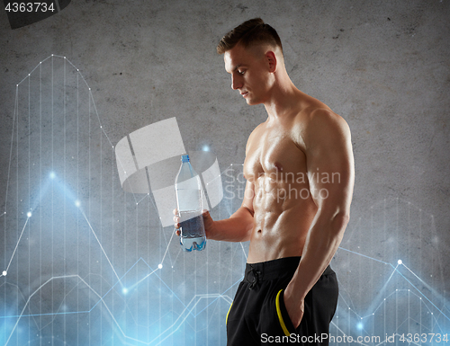 Image of young man or bodybuilder with bottle of water