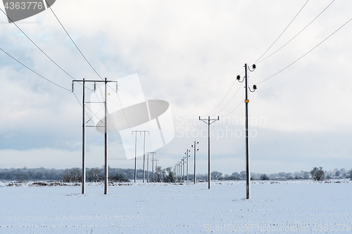 Image of Power lines in a snowy landscape