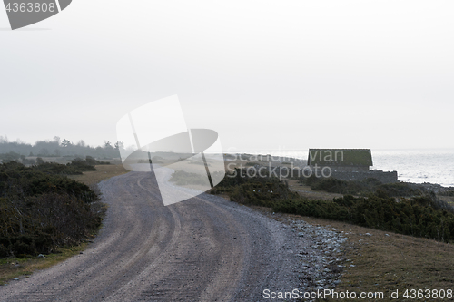 Image of Winding gravel road by the coast