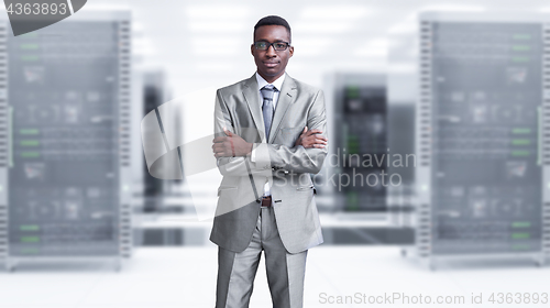 Image of Young black man in server room