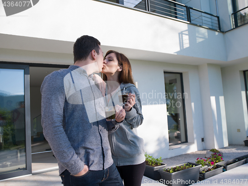 Image of couple enjoying morning coffee