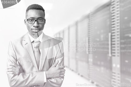Image of Young black man in server room