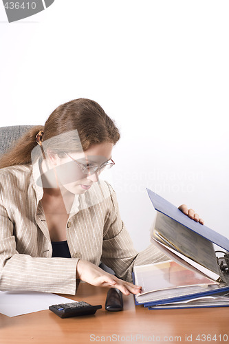 Image of The business woman works with the documentation