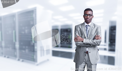 Image of Young black man in server room