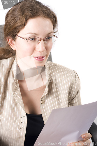 Image of The business woman reads