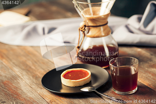 Image of The cake on wooden table