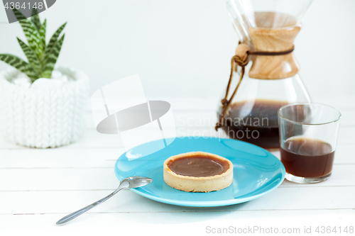 Image of The cake on wooden table