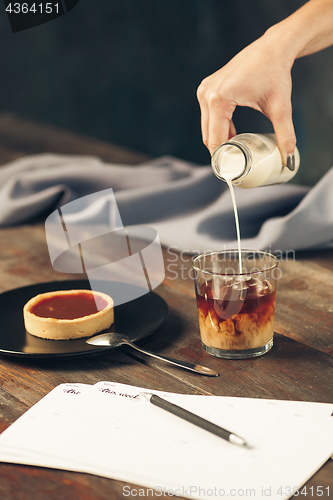 Image of The cake on wooden table