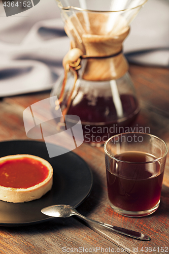 Image of The cake on wooden table