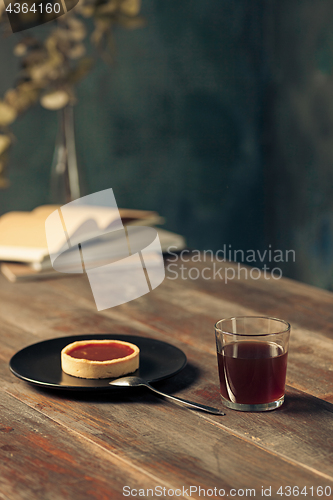 Image of The cake on wooden table