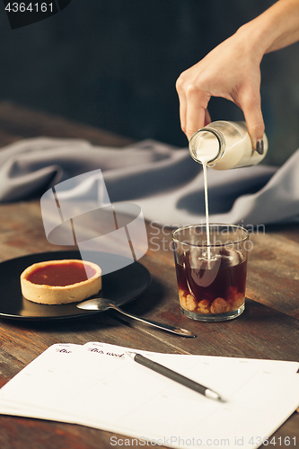 Image of The cake on wooden table