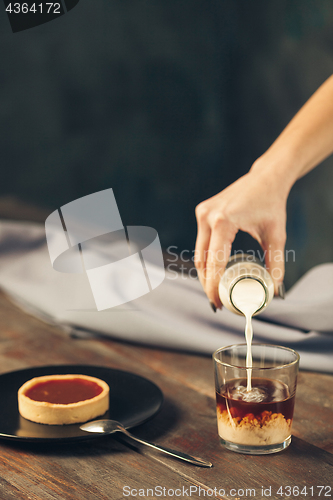 Image of The cake on wooden table