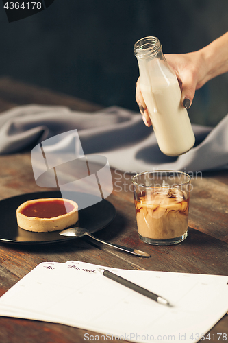 Image of The cake on wooden table