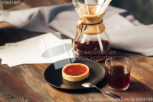 Image of The cake on wooden table