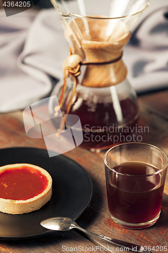 Image of The cake on wooden table