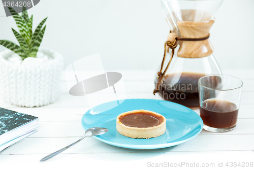 Image of The cake on wooden table