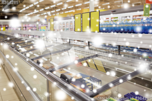 Image of freezers at grocery store