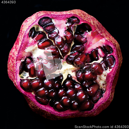 Image of Detail of an open pomegranate 