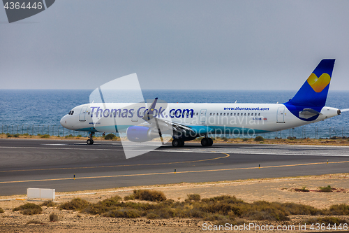 Image of ARECIFE, SPAIN - APRIL, 16 2017: AirBus A321 of ThomasCook.com w