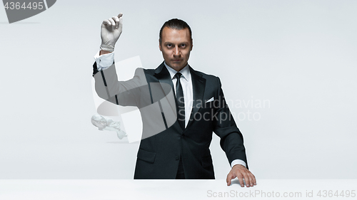 Image of At Your service, well dressed man waiting for orders isolated on white background with copy space