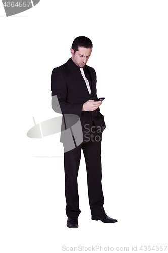 Image of Businessman Texting On His Cell Phone
