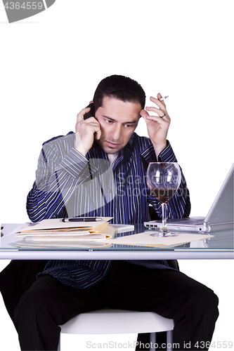 Image of Businessman at His Desk Working