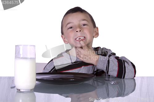 Image of Little Boy Showing His Missing Teeth