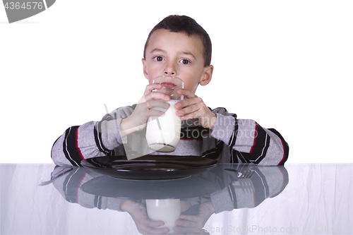 Image of Cute Boy Drinking Milk