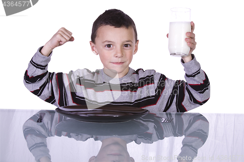 Image of Little Boy Showing His Muscles