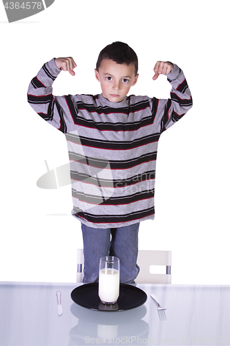 Image of Little Boy Showing His Muscles