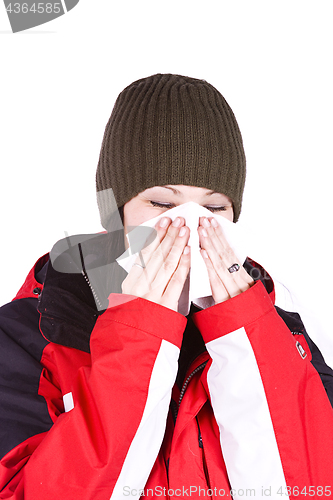 Image of Cute Girl Blowing her Nose