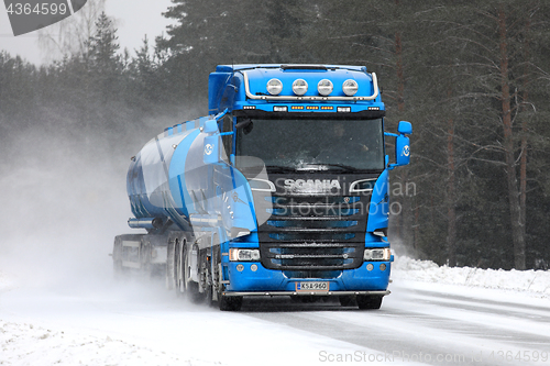 Image of Blue Scania Tank Truck on Snowy Highway