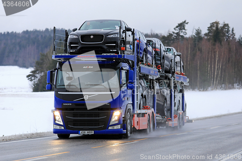 Image of Volvo FM Car Transporter in Winter Highway