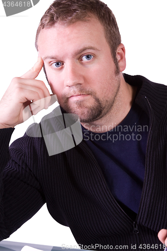 Image of Close up on a Man with his Hand on his Temple