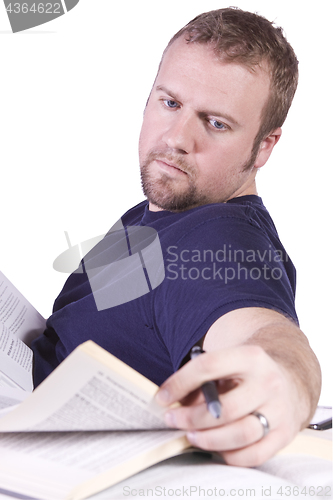 Image of College Student with Books on the Table Studying