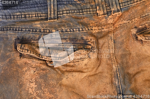 Image of Trousers with mud