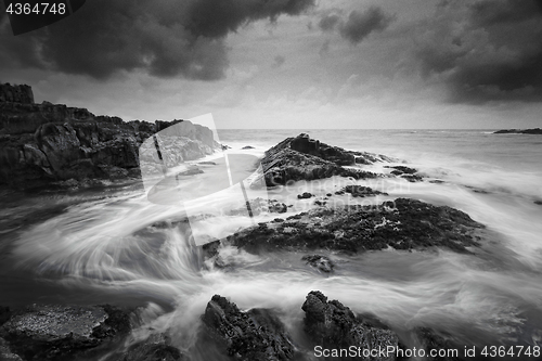 Image of Seascape with moody weather and swirling ocean flows