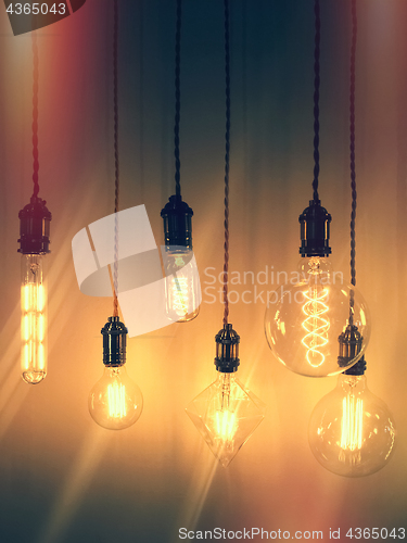 Image of Retro style image of industrial light bulbs