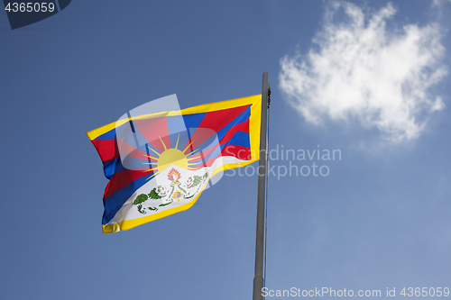 Image of National flag of Tibet on a flagpole