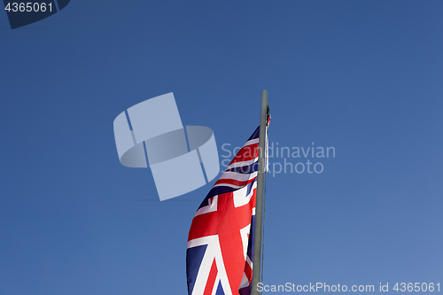 Image of UK flag on a flagpole