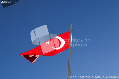 Image of National flag of Turkey on a flagpole