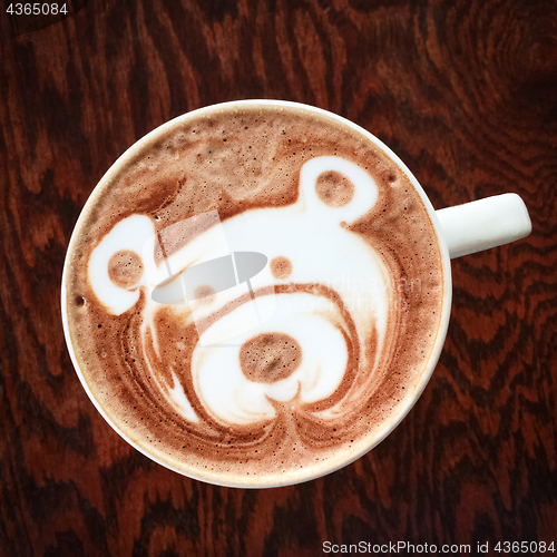 Image of Cute teddy bear drawing on hot chocolate cup