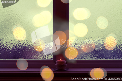 Image of Frosted window in dark evening light