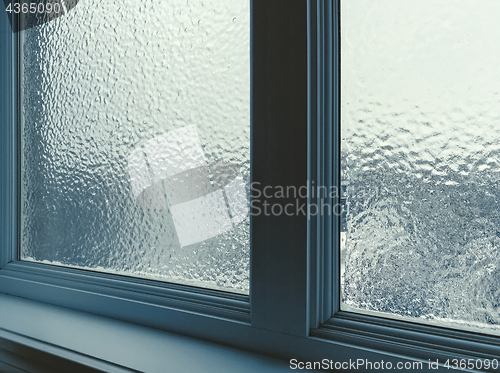 Image of Window frosted after freezing rain