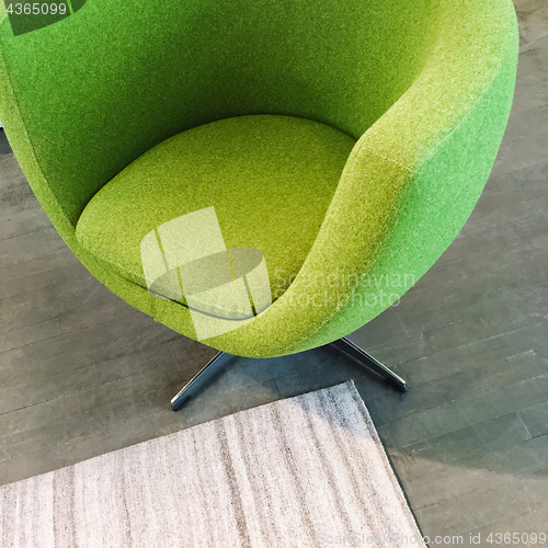 Image of Trendy green armchair