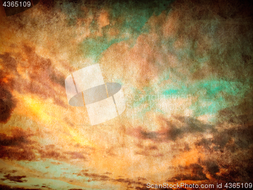 Image of Vintage sunset sky background with paper texture
